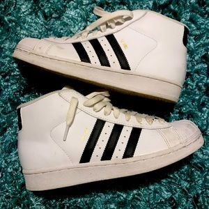 Adidas grade school high top sneakers. Size 6